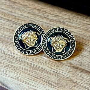 Earrings. Excellent condition. Black and gold.